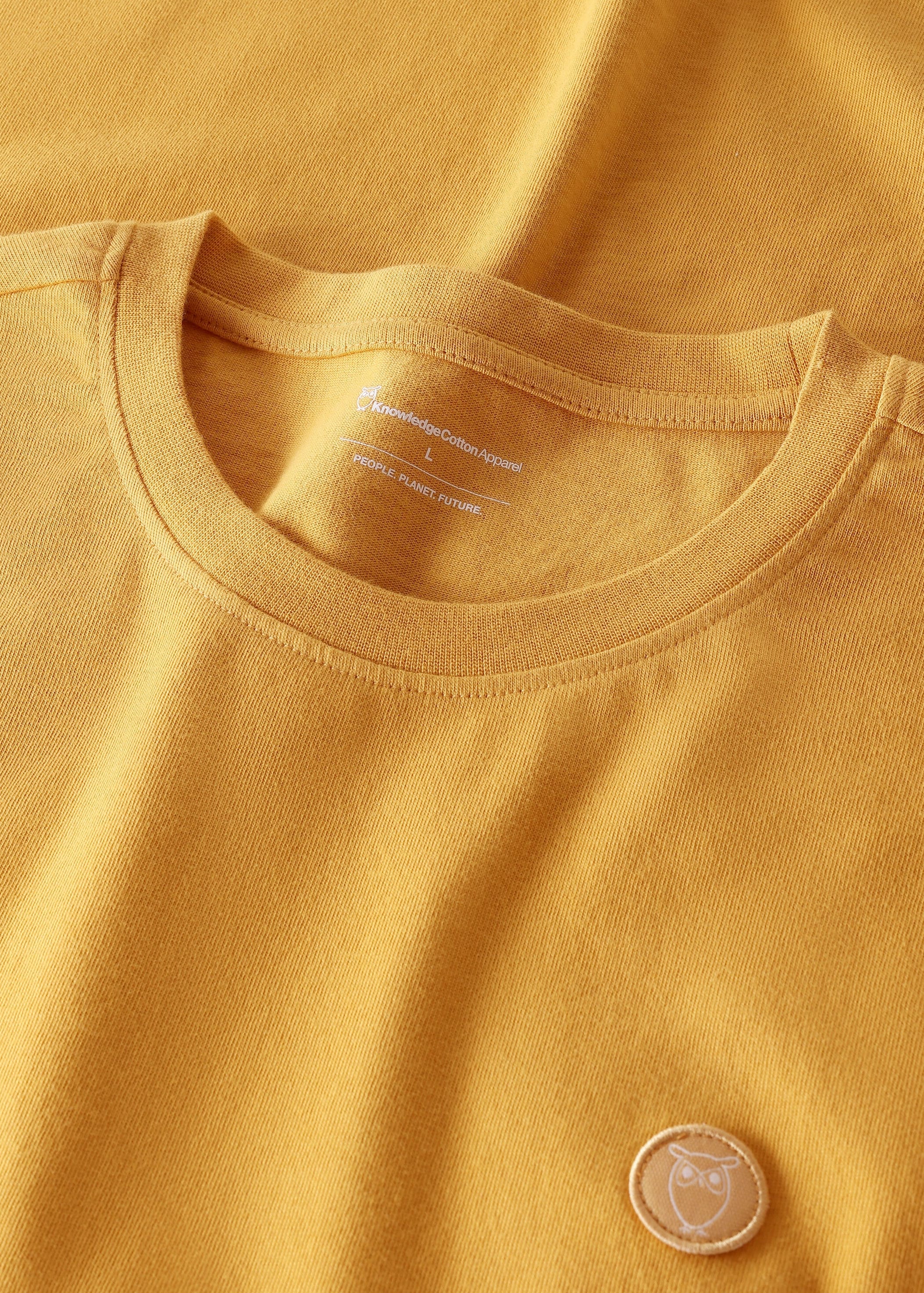 Badge T-Shirt Amber Gold Badge T-Shirt Amber Gold